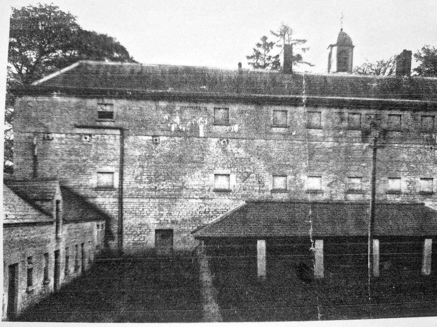The rear courtyard in an earlier survey photograph