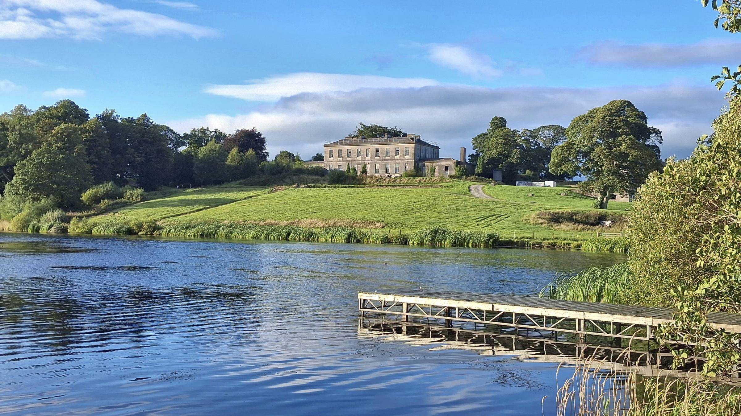 Castle Dillon House across the lake
